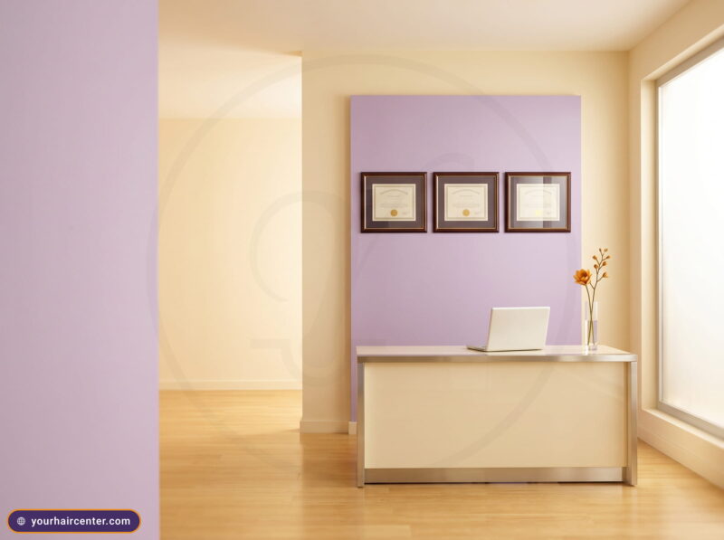 Cream-and-lavender clinic reception with three framed credentials, the check behind whether is turkey hair transplant safe